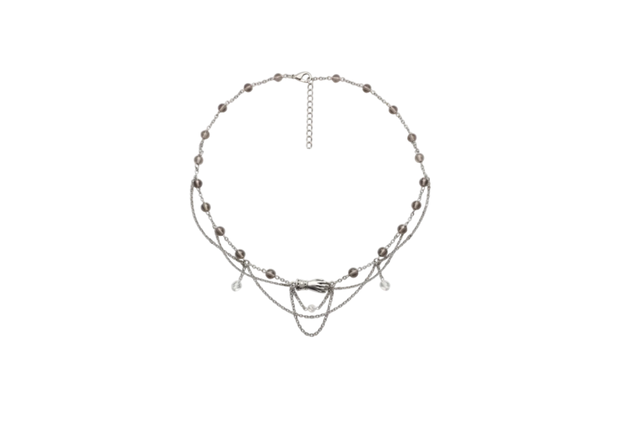 Collier La Main de la Reine, unique argenté, obsidienne de glace, cristal de roche, pendentif main